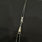 Black jacket zipper with metal pull