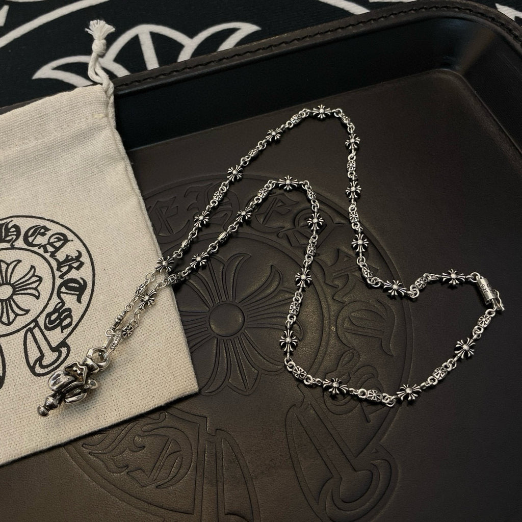 Chrome accessories silver-tone chain bracelet on jewelry box with pouch