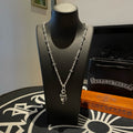 Chrome accessories silver-tone chain necklace with floral links and dangling charm