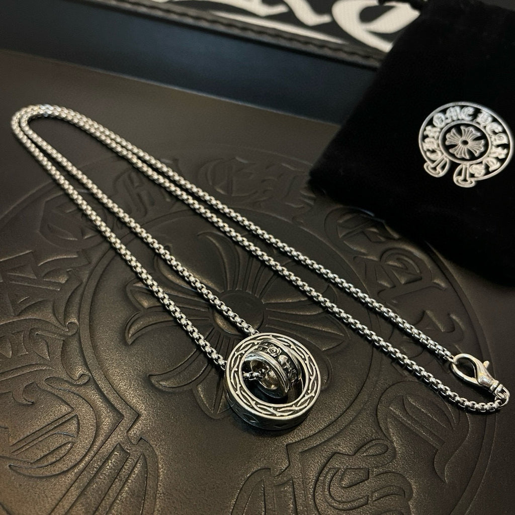 Chrome Accessories double-strand necklace with round pendant on embossed tray.