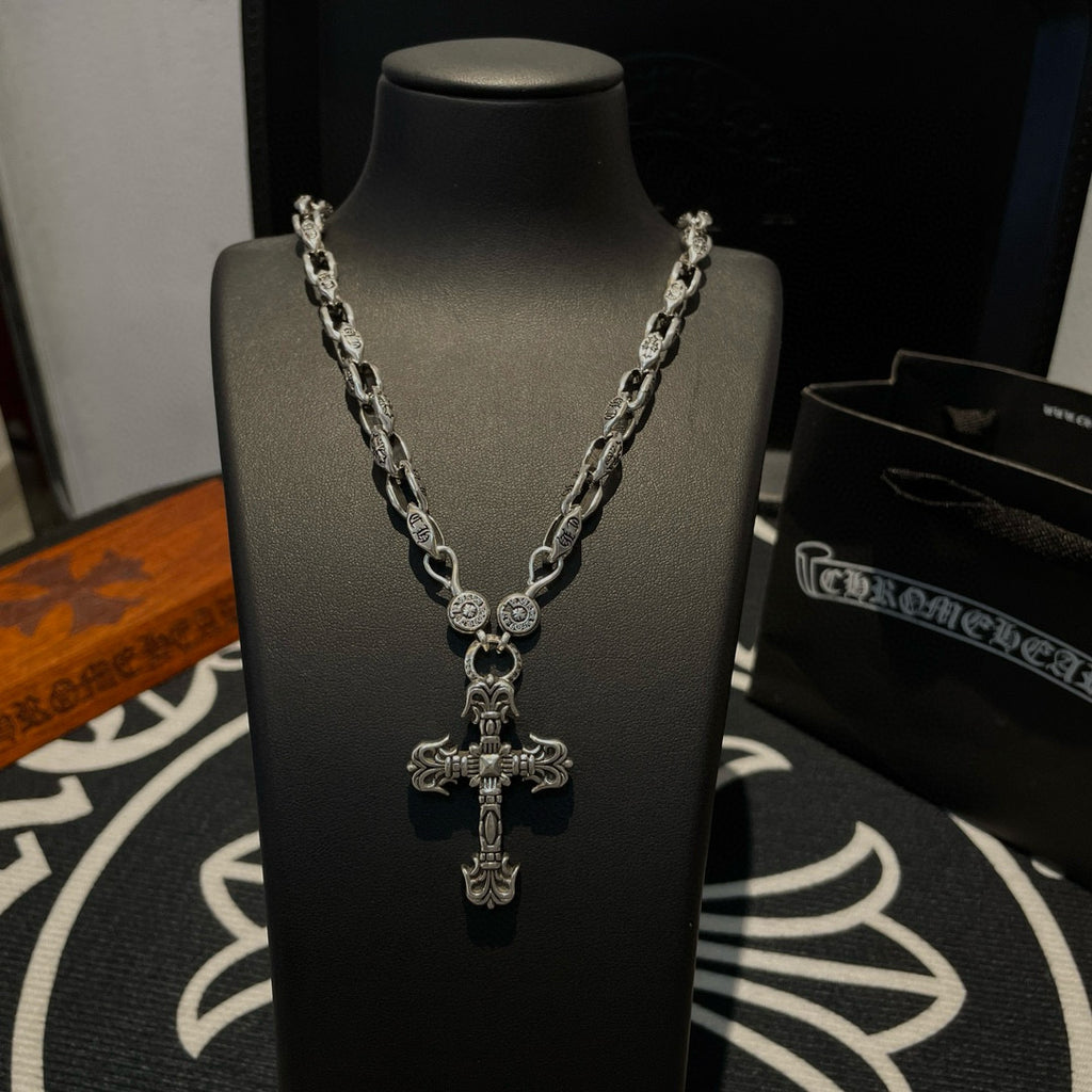 Silver chain cross pendant necklace with large center cross charm