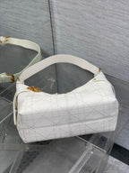 Dior white quilted leather hobo bag with gold zipper detail and strap