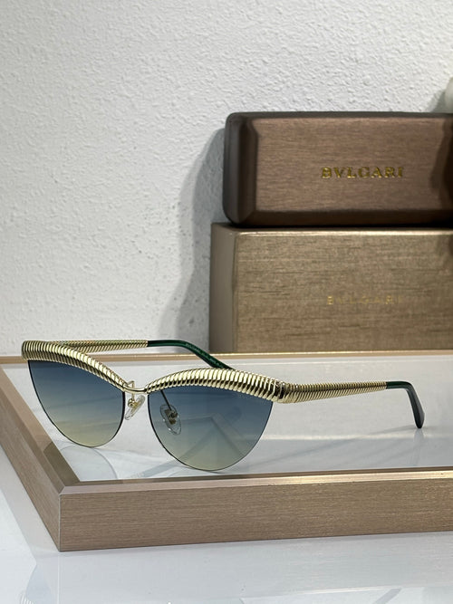 Bvlgari sunglasses with gold wireframe and blue-tinted round lenses