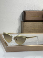 Bvlgari sunglasses with gold wireframe and light tinted round lenses