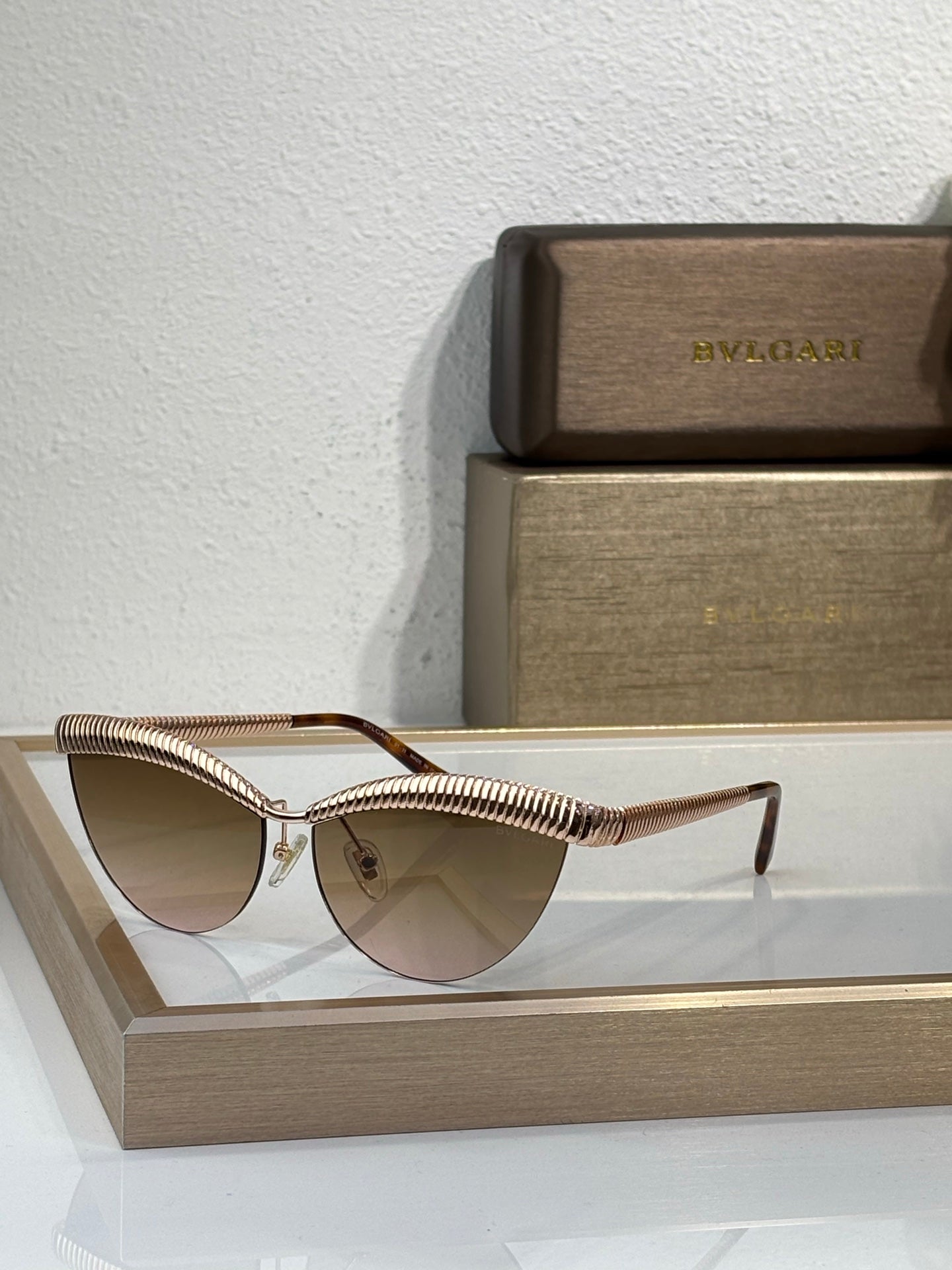 Bvlgari sunglasses with gold wireframe and gradient tinted round lenses