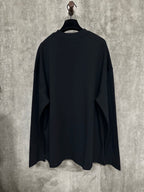 Black long-sleeve crewneck shirt, back view