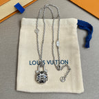 Silver-tone layered charm necklaces with cat pendant and small charms