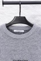 Gray knit sweater neckline with GIVENCHY label on collar