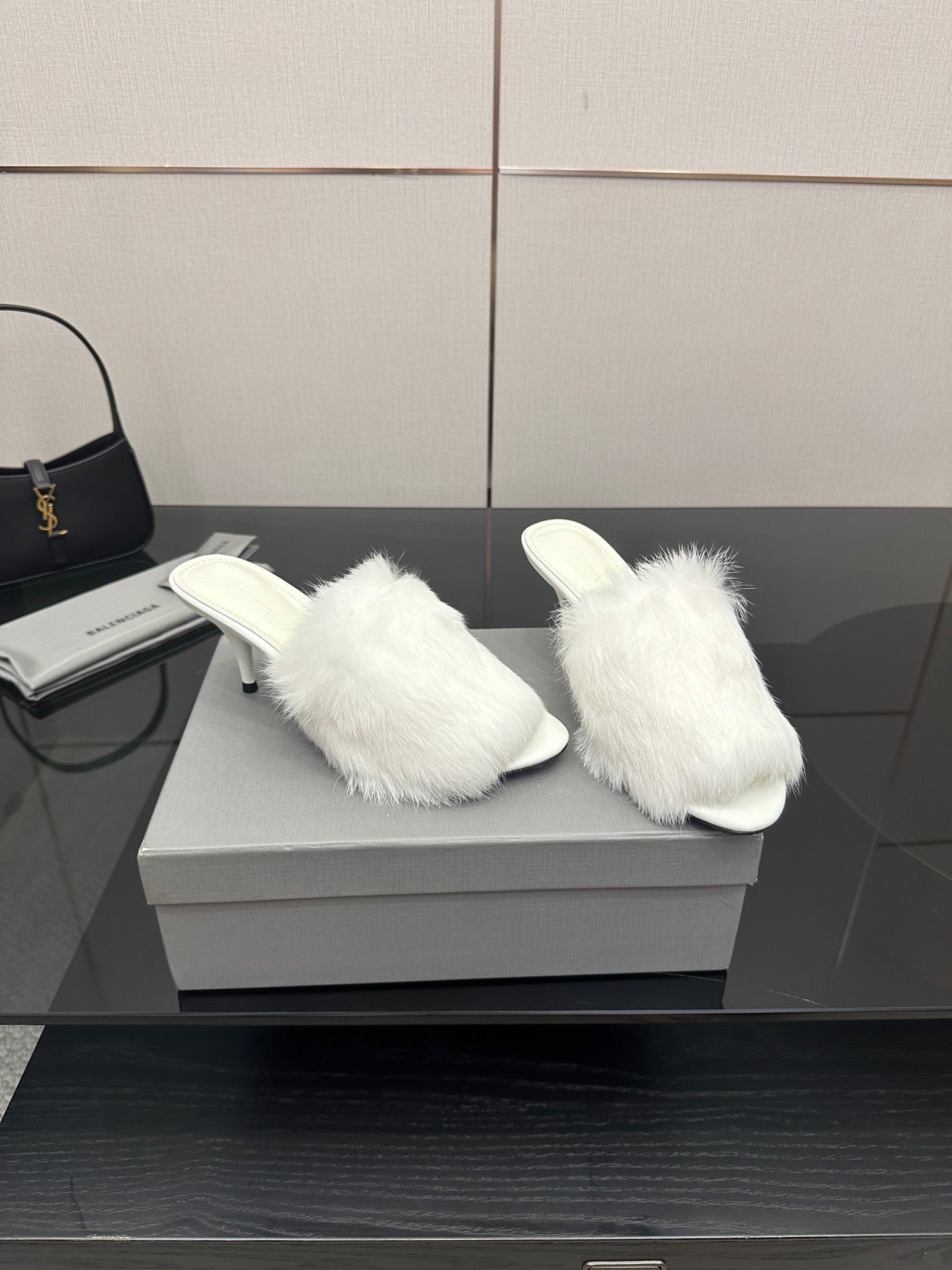 White faux-fur slide sandals on box, open toe with low heel