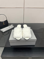 White faux-fur slide sandals with low heel, open toe