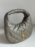 Quilted hobo bag in metallic gray with gold YSL logo and open top view