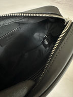 Fendi bag interior close-up with inner logo label and silver zipper track