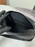Fendi small bag interior with multiple card slots and black lining, zippered opening