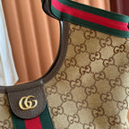 Gucci GG tote bag, brown leather handle with gold GG emblem and Web stripe