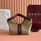 Gucci GG monogram tote bag with red-green Web stripe and dark top handle