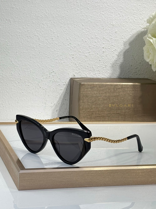 Bvlgari sunglasses with black frames, dark lenses, and gold braided temple cords