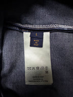 Louis Vuitton denim care label with Made in Italy and washing symbols on inside tag