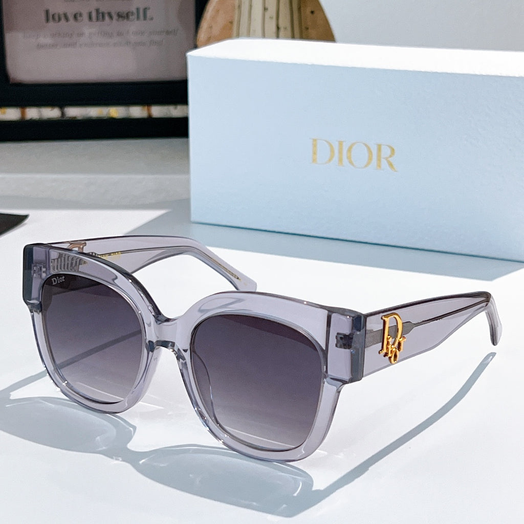 Silver acetate sunglasses with rounded cat-eye frames and dark gray tinted lenses, Dior detail