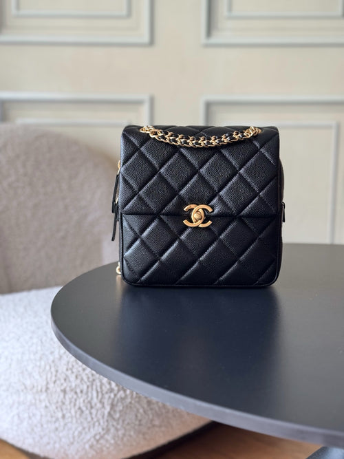 Chanel quilted leather mini bag, black with gold chain strap and CC clasp