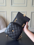 Chanel quilted mini bag, black with gold CC hardware and chain crossbody