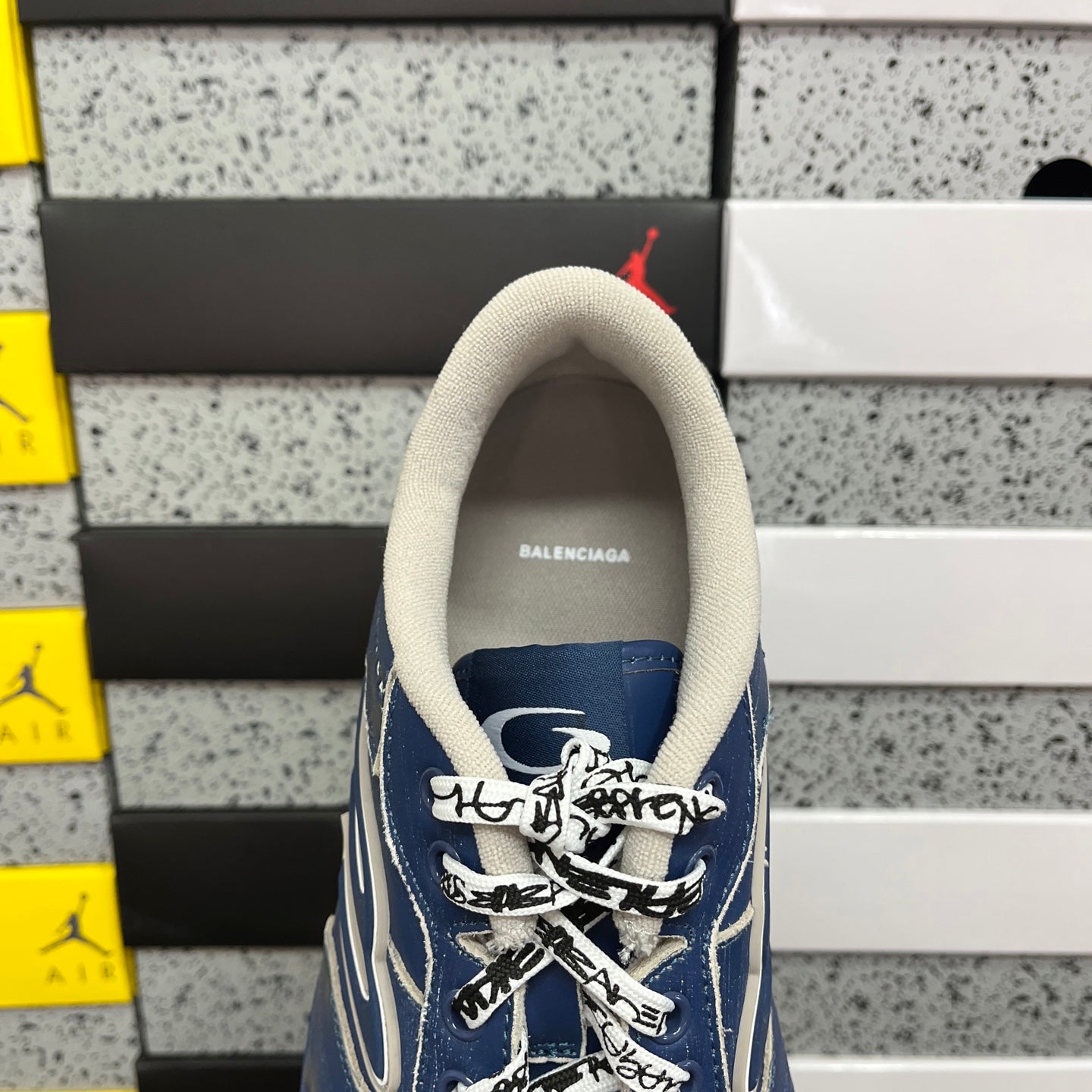 Blue sneaker heel with BALENCIAGA text on light lining