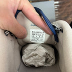 Inside sneaker label with Balenciaga branding and size info on white lining