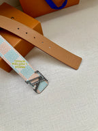 Louis Vuitton belt showing tan leather underside with holes and patterned strap