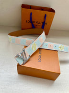 Louis Vuitton belt with turquoise-and-white patterned strap and gold-tone buckle