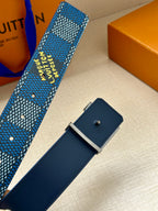Blue Louis Vuitton belt with dark navy leather keeper and square silver buckle