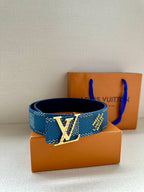 Blue patterned Louis Vuitton belt with silver LV buckle on a stack