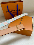 Louis Vuitton belt with light blue and white patterned strap and tan leather hardware.