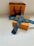 Louis Vuitton belt with blue check webbing and gold-tone LV buckle and strap end