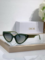 Bvlgari cat-eye sunglasses with green frames and dark lenses