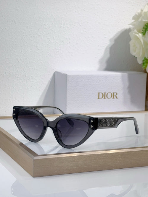 Bvlgari cat-eye sunglasses with black frames and patterned temple detail