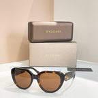 Bvlgari round sunglasses with brown lenses and tortoiseshell-style frames
