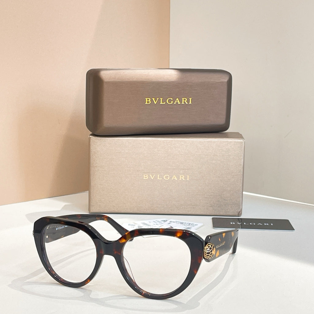 Bvlgari round sunglasses with clear lenses and black frames, gold side emblem