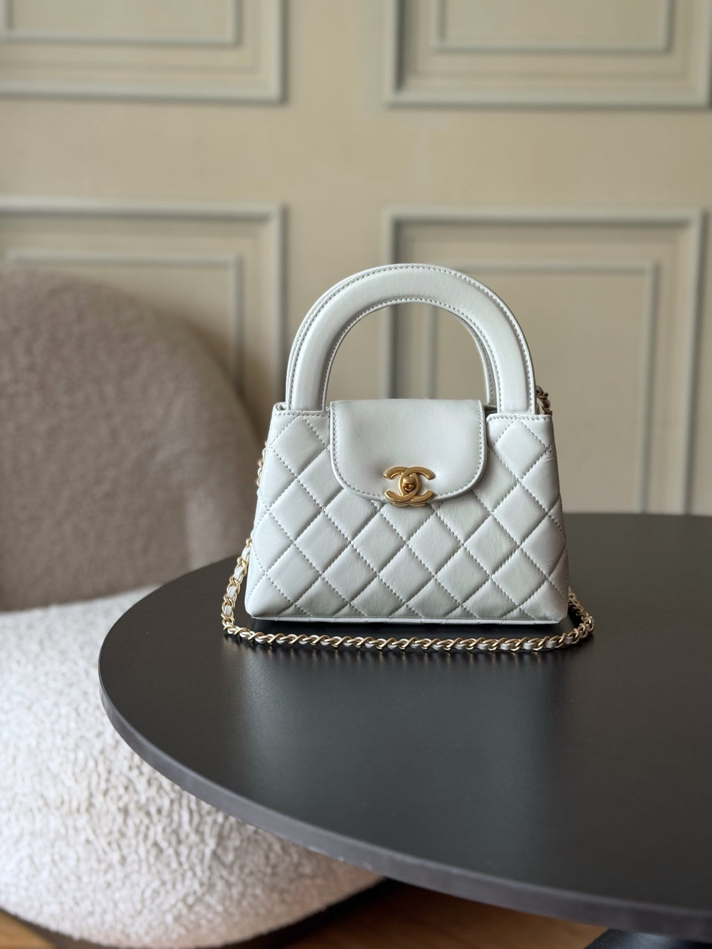 Chanel quilted mini handbag in white with gold CC clasp and chain strap