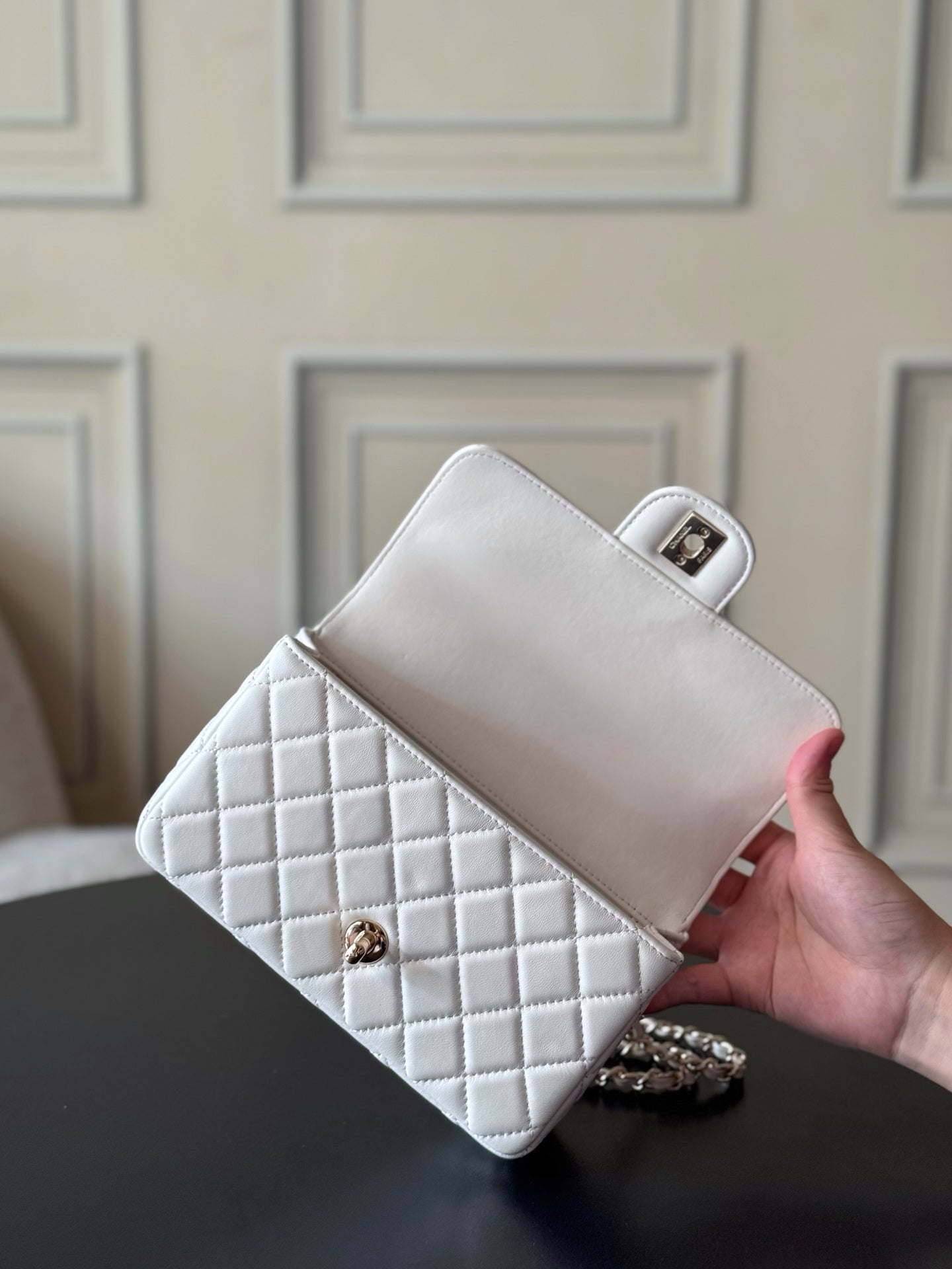 Chanel quilted white mini flap bag with top clasp and removable chain