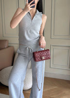 Quilted burgundy leather Chanel crossbody handbag worn on model's shoulder