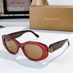 Bvlgari sunglasses with red frame and tan tinted lenses
