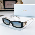 Dior sunglasses, black frame with gold-tone arms and dark lenses