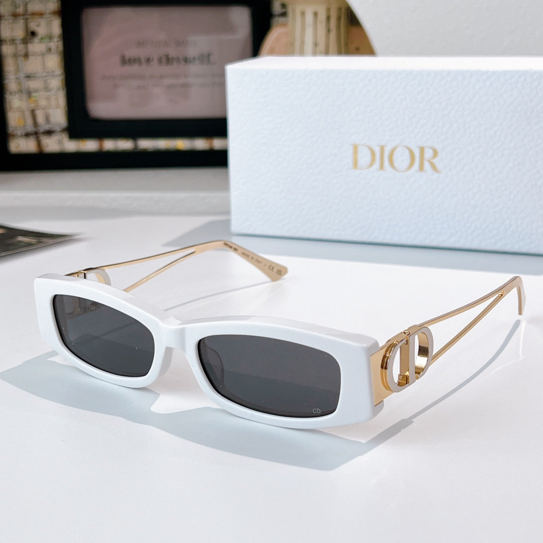Dior sunglasses, white frame with gold-tone details and dark lenses