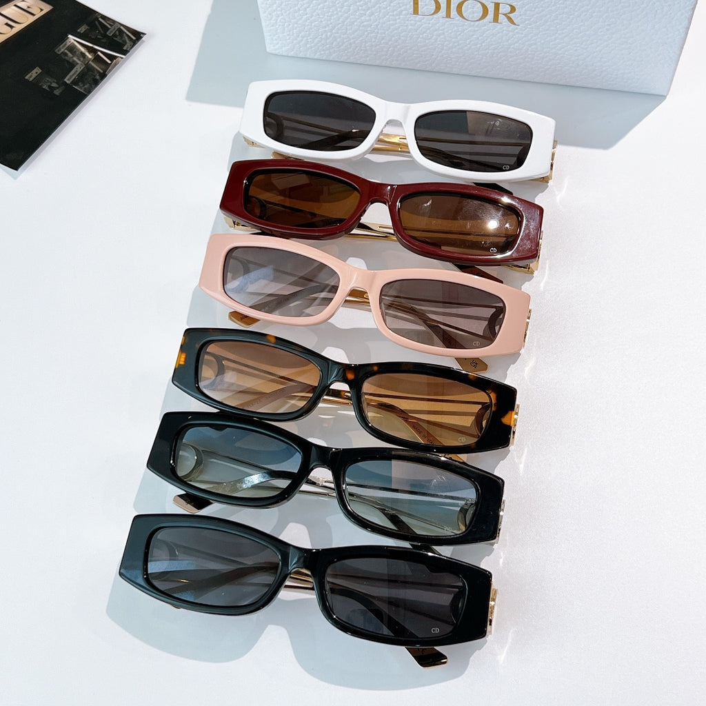 Dior sunglasses assortment, multiple frames in white, burgundy, blush, and black with tinted lenses