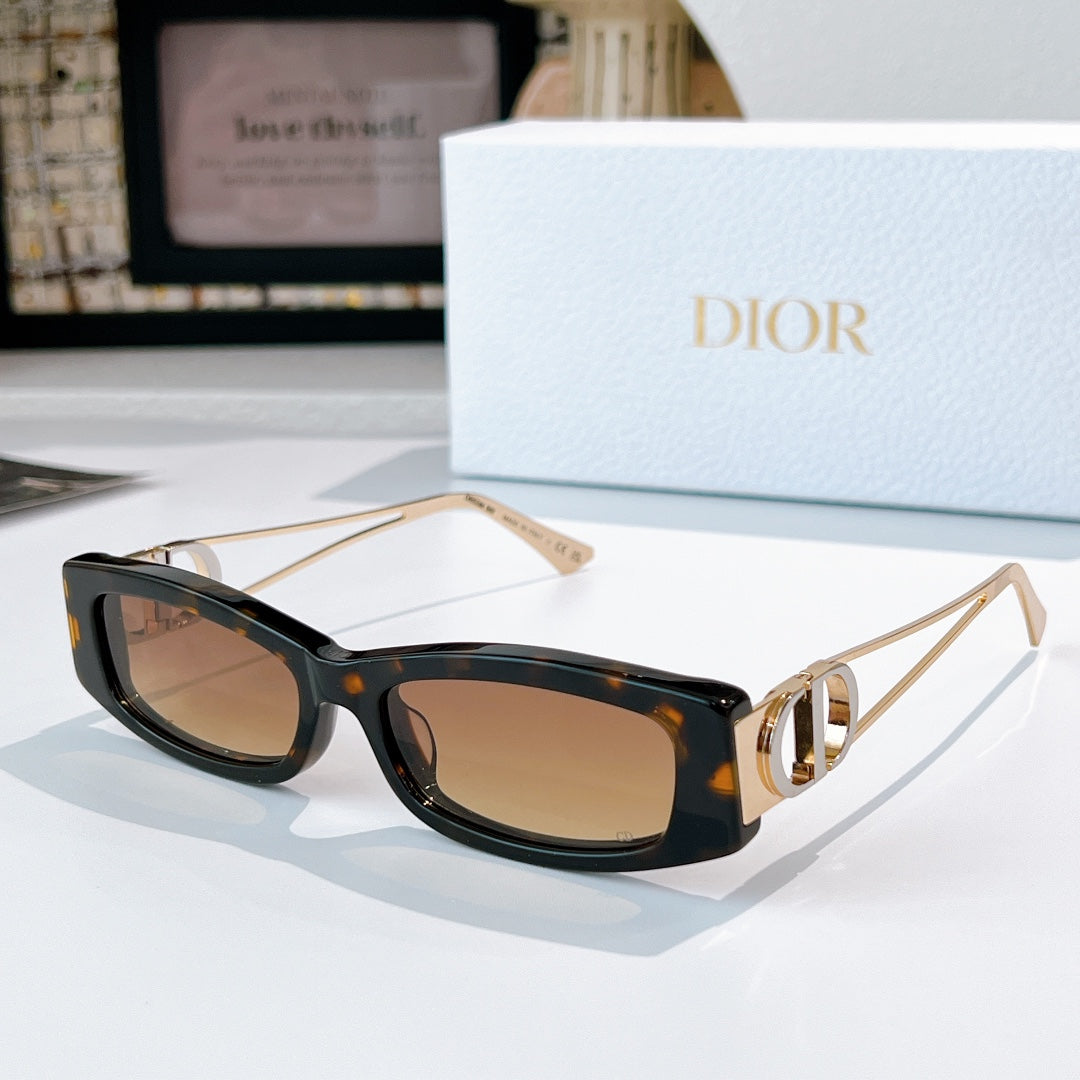 Dior sunglasses, dark tortoiseshell frame with gold-tone details and brown lenses