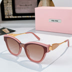 MiuMiu cat-eye sunglasses with pink frames and gold-tone temples, tinted rose lenses