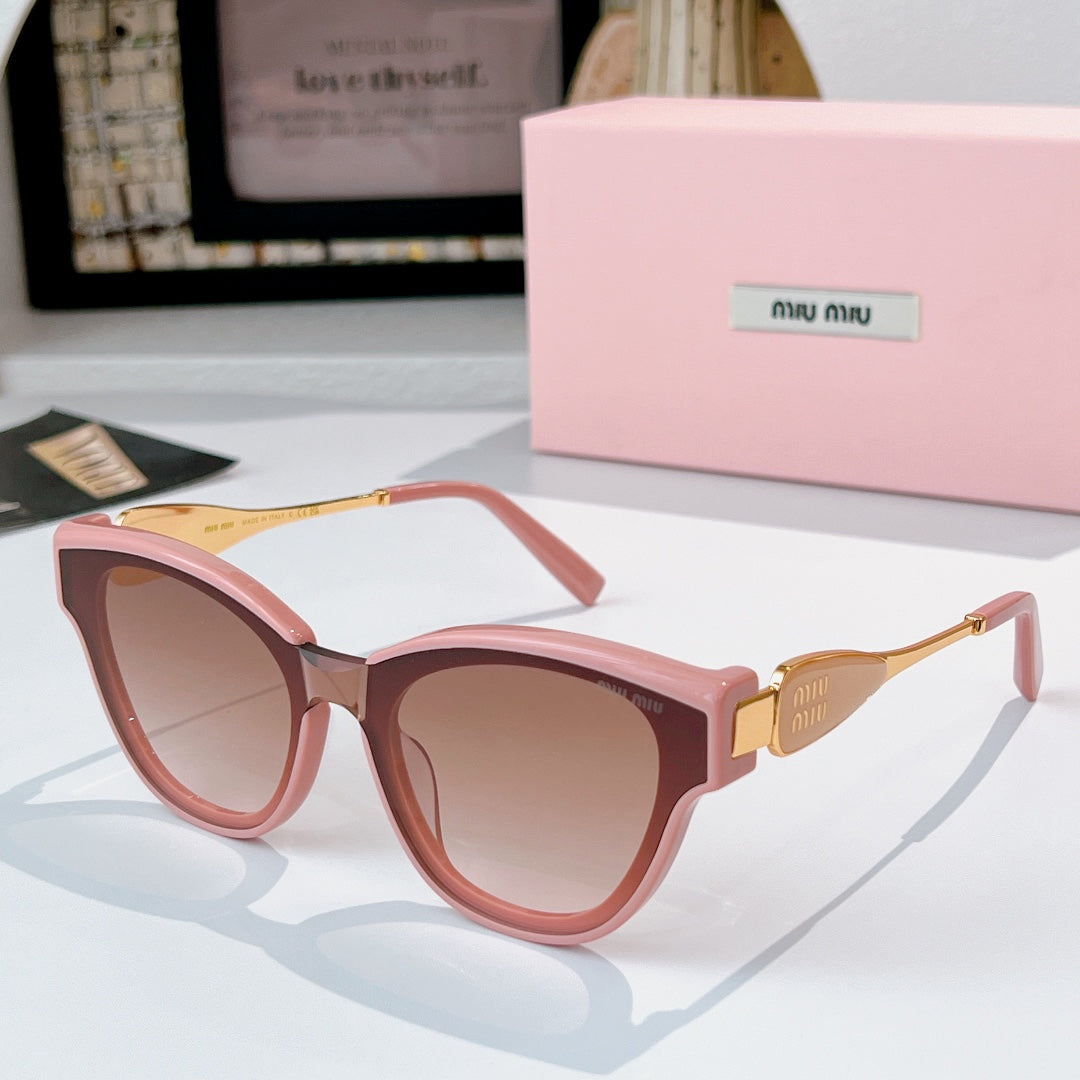 MiuMiu cat-eye sunglasses with pink frames and gold-tone temples, tinted rose lenses