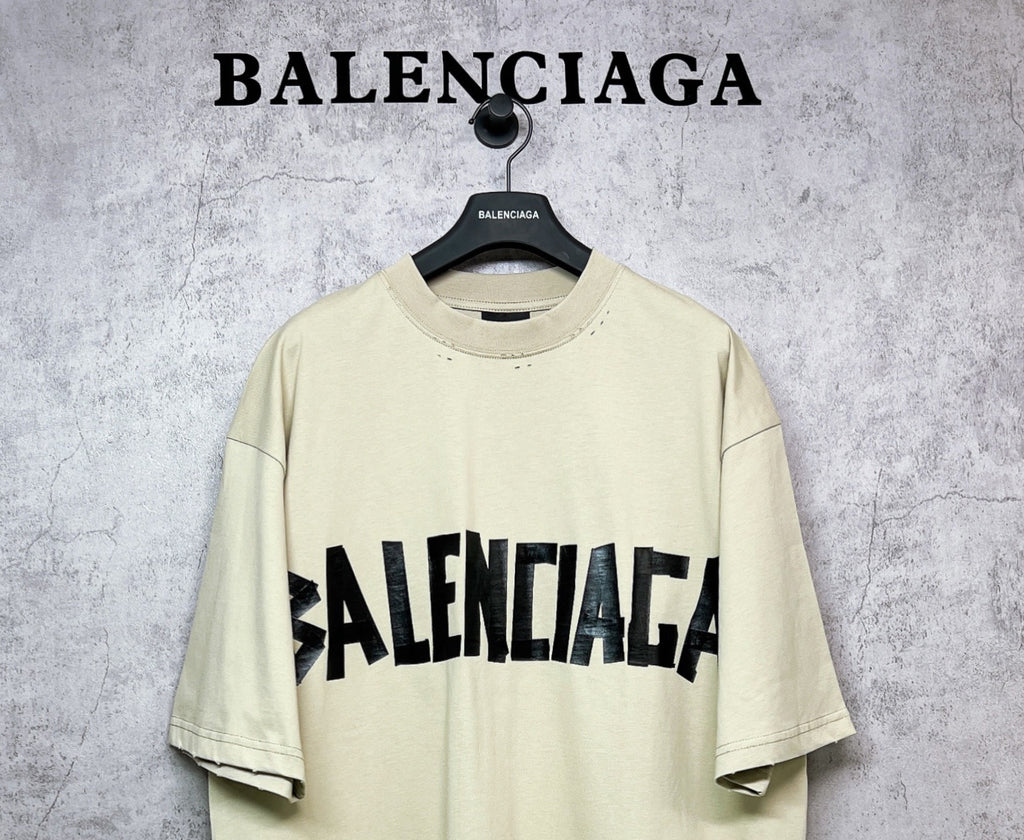 Balenciaga short-sleeve T-shirt, pale yellow with black front logo