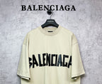 Balenciaga short-sleeve T-shirt, pale yellow with black front logo