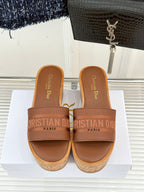 Brown leather slide sandals with cork platform and Dior logo strap, open toe