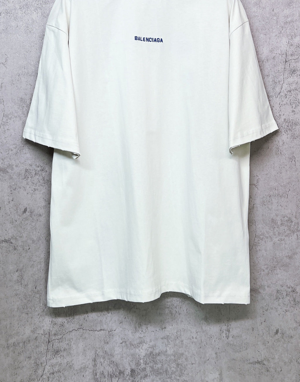 White T-shirt with BALENCIAGA chest logo, short sleeves, crew neck.